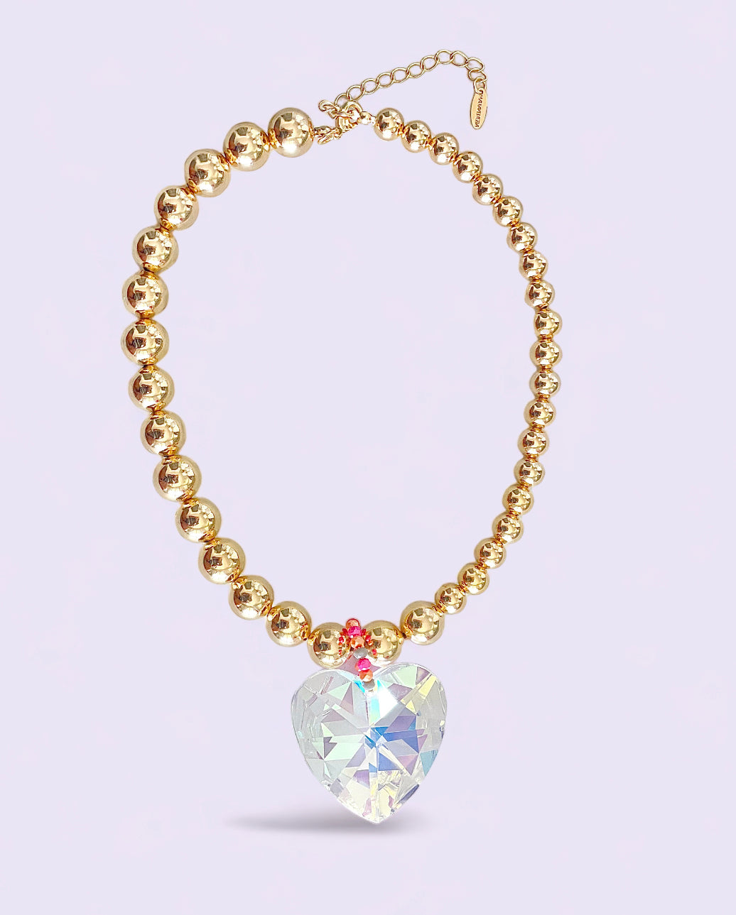 Collar de balines dorados con corazón de Cristal