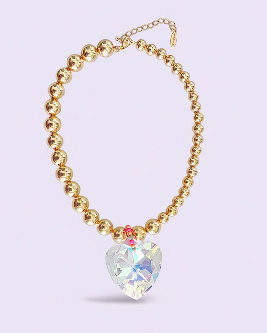 Collar de balines dorados con corazón de Cristal